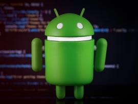 Google Android figure on digital blur background. Google Android is the operating system for smartphones, tablet computers, e-books, game consoles, and other devices. Moscow, Russia - March 18, 2019