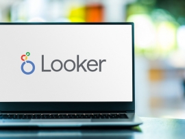 Laptop computer displaying logo of Looker Data