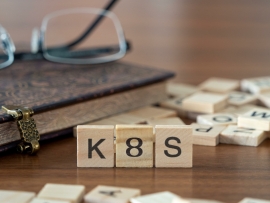 The acronym k8s for kubernetes concept represented by wooden letter tiles